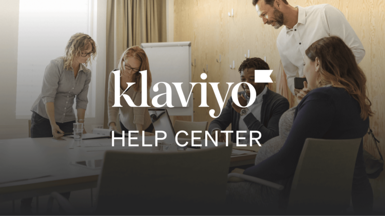 White text reads "Klaviyo Help Center" over a photo of people brainstorming a solution in a conference room.