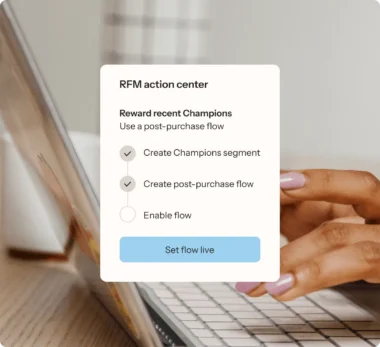 RFM action center interface on a laptop screen, showing options to reward recent Champions with a post-purchase flow.
