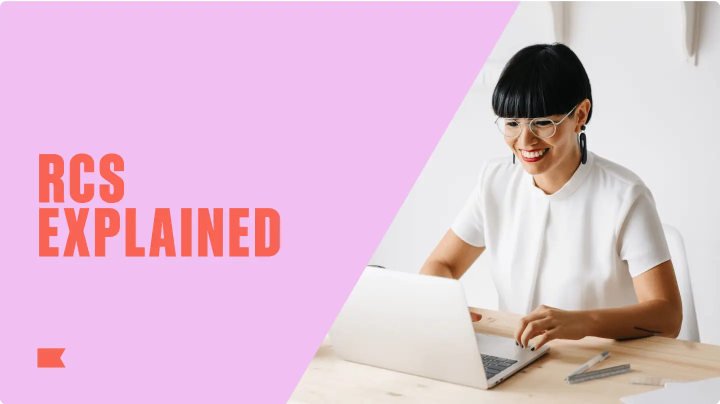 RCS Explained" text on pink background, woman in white shirt smiling at laptop.