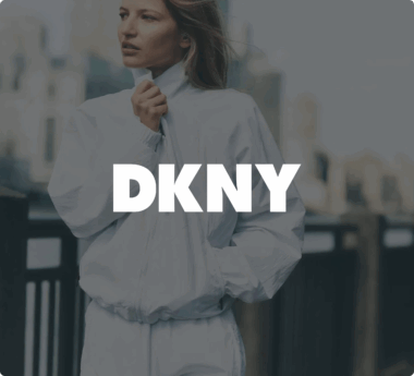 Person in a white jacket with "DKNY" text overlay.