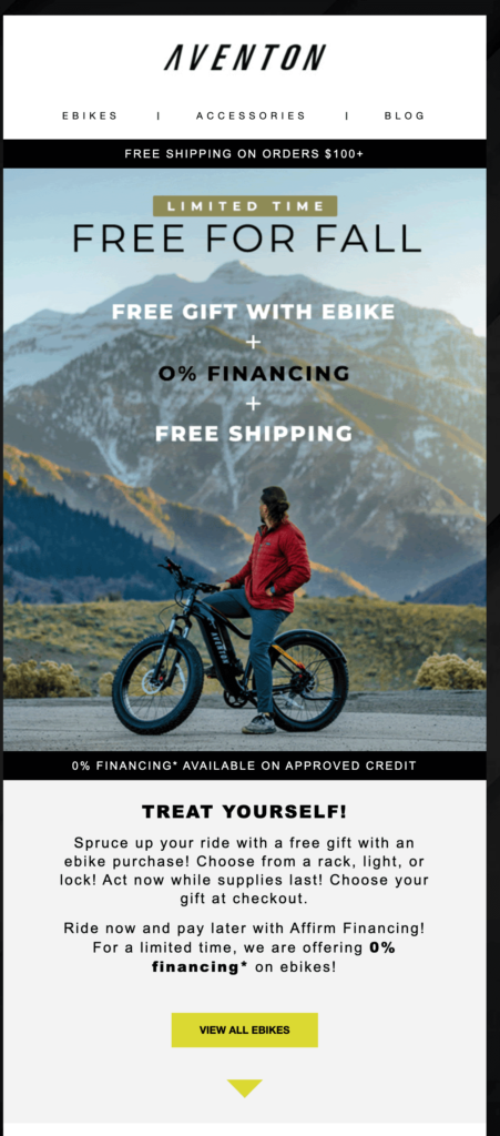man in a red jacket on a bike