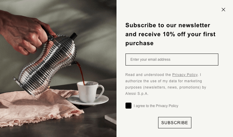 metal coffee maker next to Alessi’s signup form