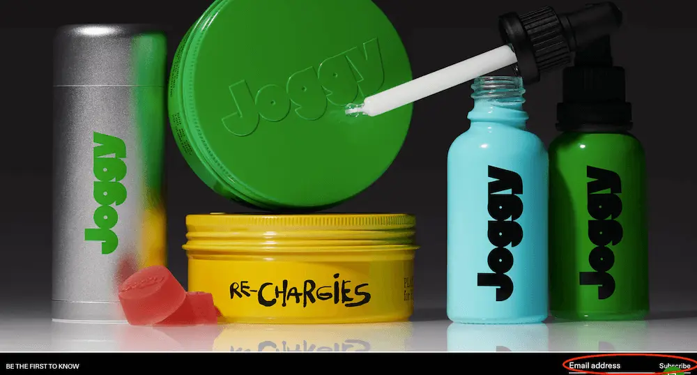Image shows colorful bottles with Joggy’s logo on them, and at the bottom right, circled in red, is a field for users to enter their email address.